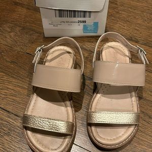 Girls nude patent leather sandals with gold strap and silver strap details